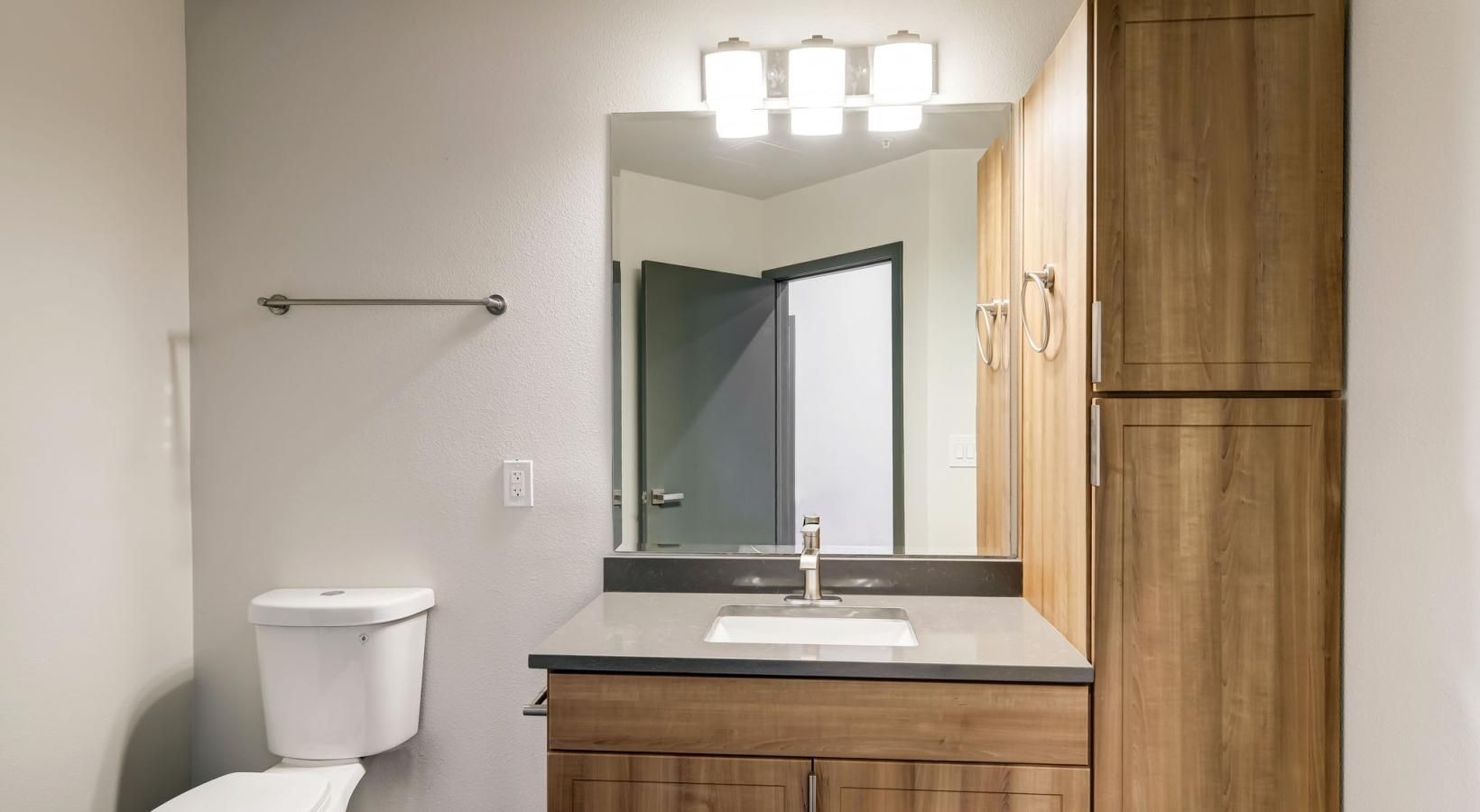 Bathroom options with thoughtful details a bathroom with a mirror and sink