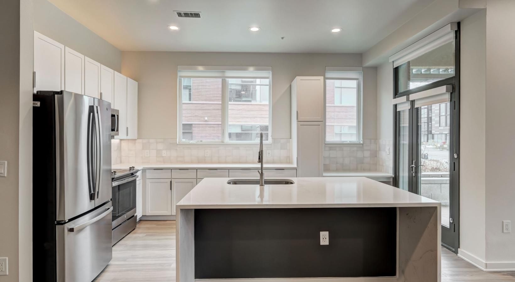 Beautiful kitchens with designer finishes a kitchen with a large island