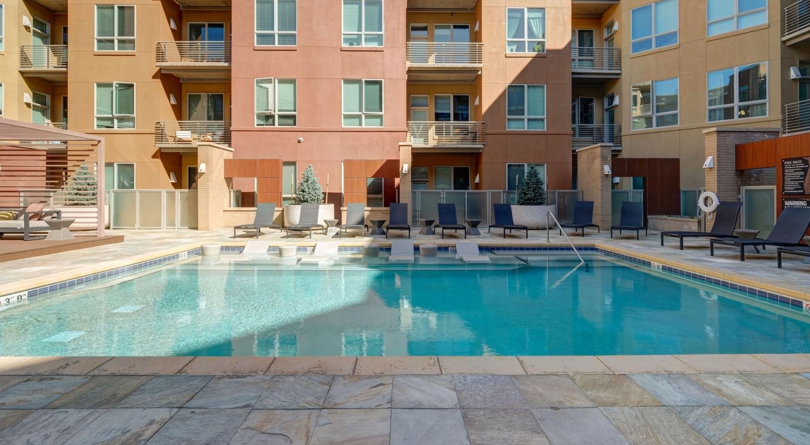 Sparkling swimming pool a swimming pool in front of a building