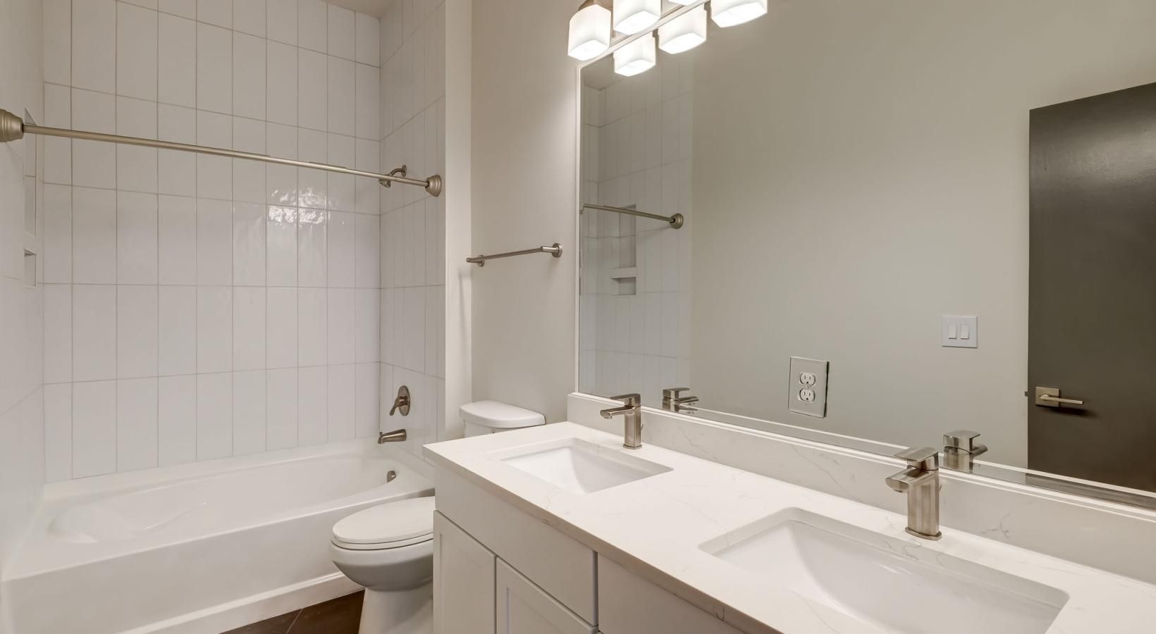 Spacious bathrooms with everything you need a bathroom with a large mirror