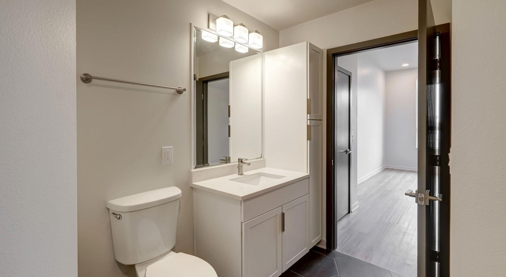 Spacious bathrooms with everything you need a bathroom with a toilet and sink